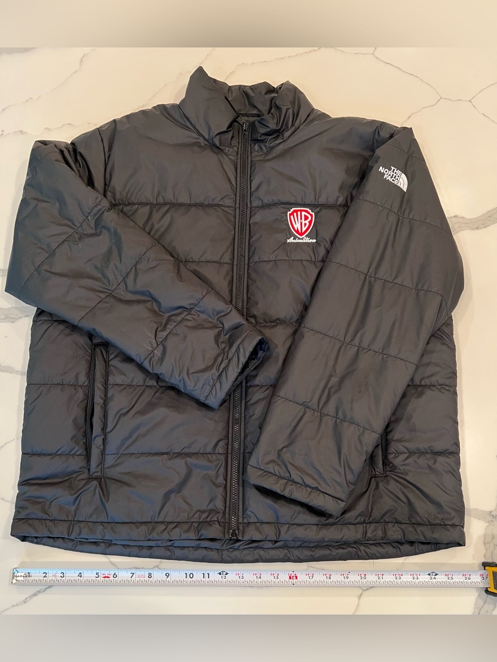 The North Face Black Puffer Jacket with Warner Brothers Animation Logo